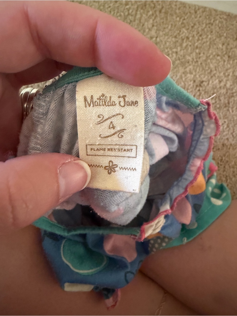 Matilda Jane Teal Bib with Pink, Yellow and Blue Petal Accents